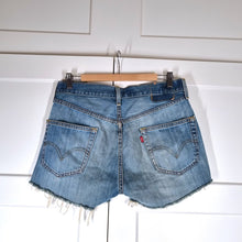 Load image into Gallery viewer, Vintage Levi&#39;s Shorts Denim Cut Offs Ripped Distressed Button Fly Blue 10 12
